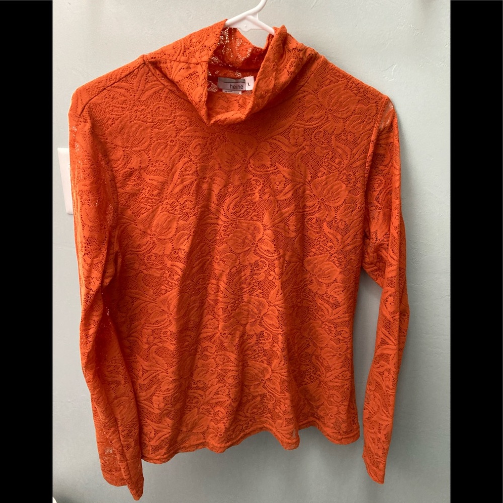 Orange lacy mock turtleneck